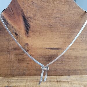 Elegant Sterling Silver Bow Necklace